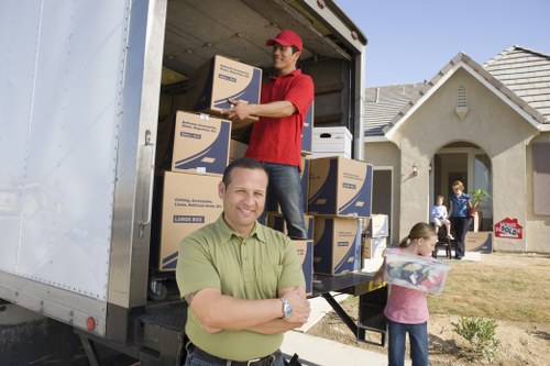 Careful packing materials used for fragile items during Brockley house removals