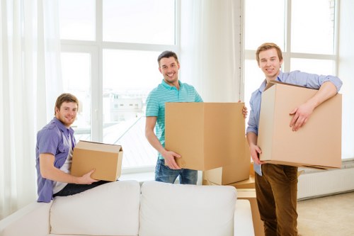 Packed office equipment prepared for a business move in Brockley