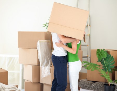 Team handling furniture during a professional van removal job
