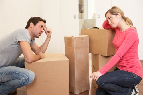 Professional movers handling furniture and fragile items