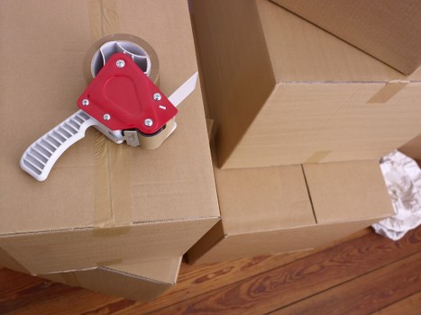 Packing boxes and household items for storage in Brockley