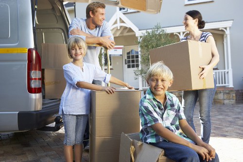 Professional student moving service handling furniture in Brockley