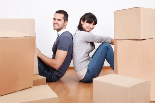 Local movers handling furniture near Brockley homes